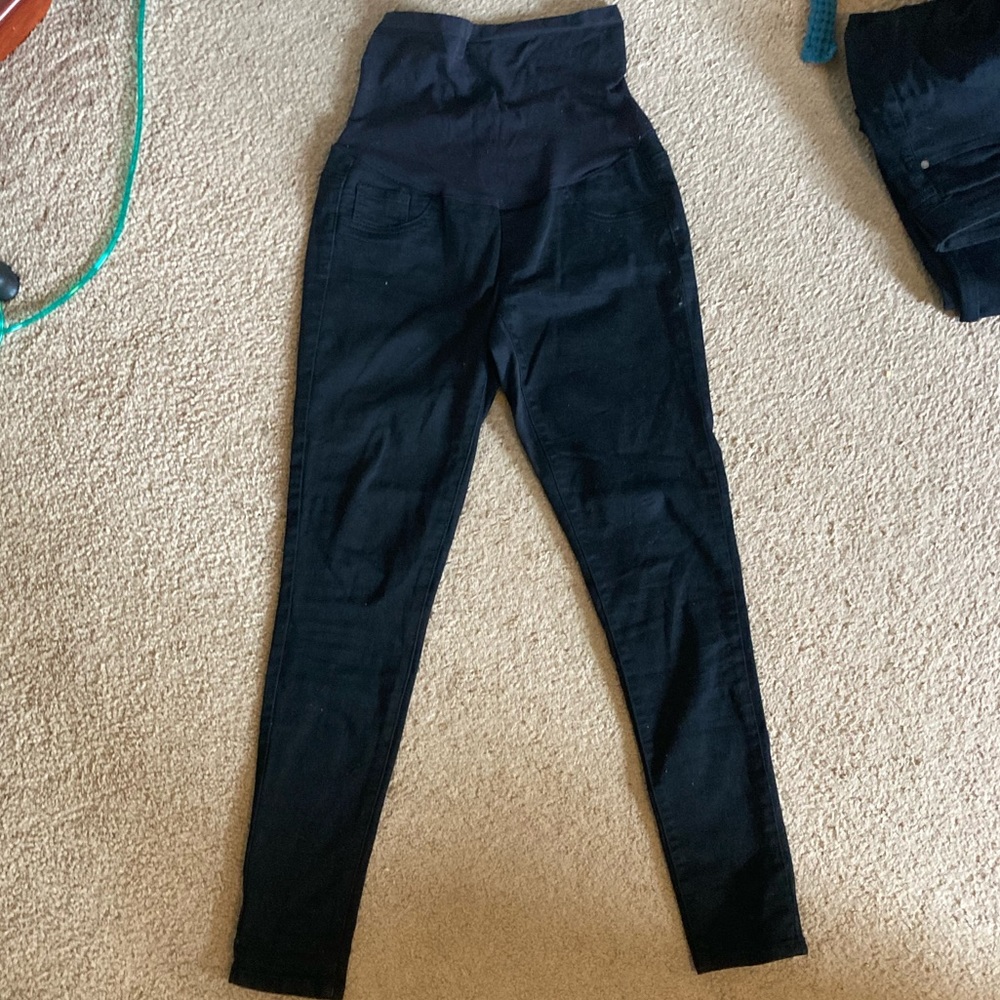 Black skinny maternity  Jean with over-the-belly waistband.